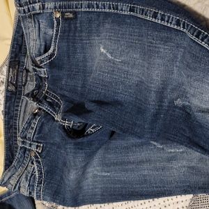 Women's distressed boot cut jeans